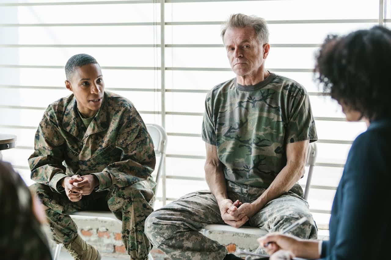 Veteran adjusting to civilian life while managing men's mental health challenges Search: "veteran sitting alone reflective civilian transition