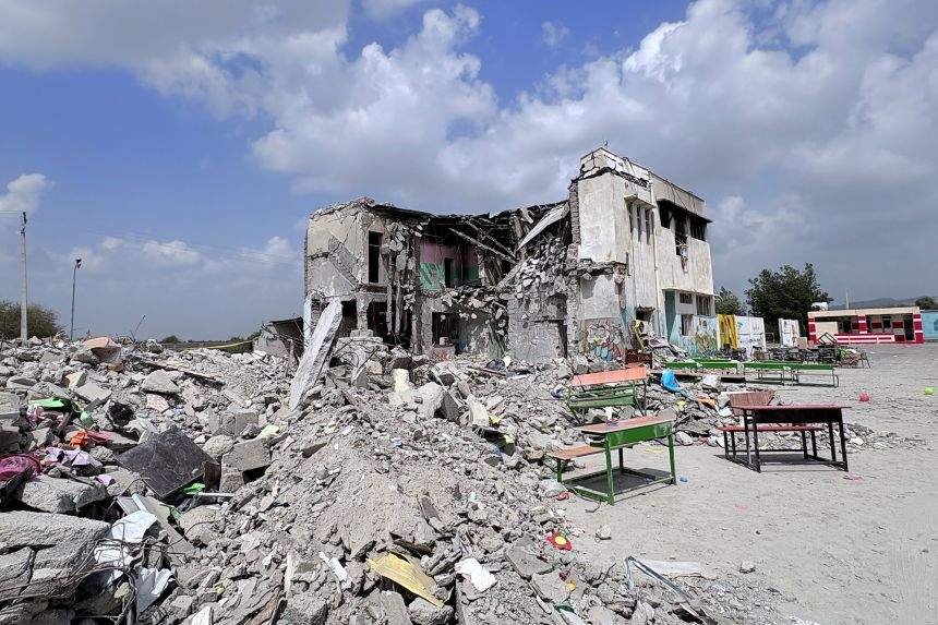 Minab school bombing rubble US bombs Iran school children killed
